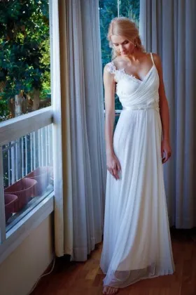 Asymmetrical appliqued shoulder spaghetti straps V neck ivory bridal gown