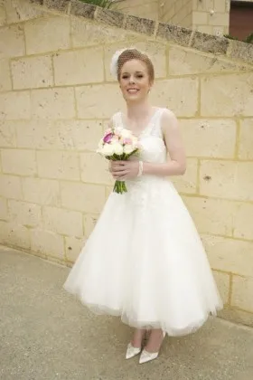 Cute tea length A line ivory lace and tulle V neck spring wedding dress