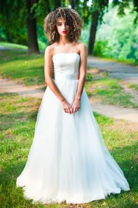 Pretty strapless white satin and tulle floor length A line wedding gown