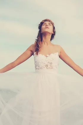 White lace and tulle illusion neck sleeveless casual floor length bridal dress