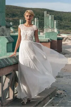 Ivory lace and chiffon illusion neckline cap sleeve outdoor A line wedding gown
