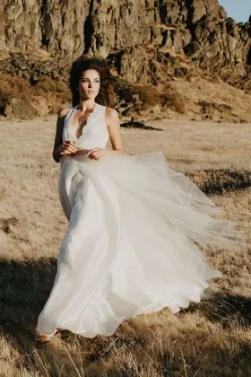 Subtle scalloped plunging neckline ivory lace satin and tulle bridal gown