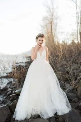 spaghetti straps curved V neck low back ivory tulle ball gown wedding dress