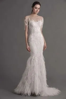 gorgeous wedding dress with illusion lace short sleeves mermaid feather skirt