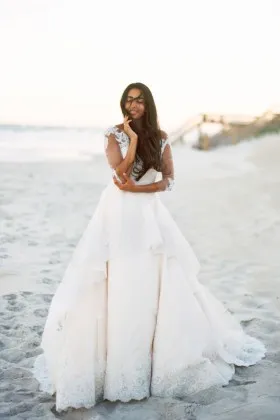 illusion scoop neckline half sleeve ivory lace tiered ball gown wedding dress