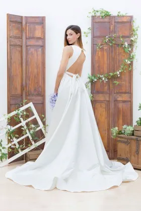 envelop back sleeveless jewel neckline sleek ivory satin wedding dress