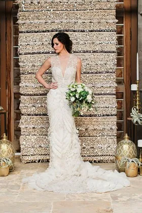 unique ruffled details sleeveless plunging V neckline ivory wedding dress