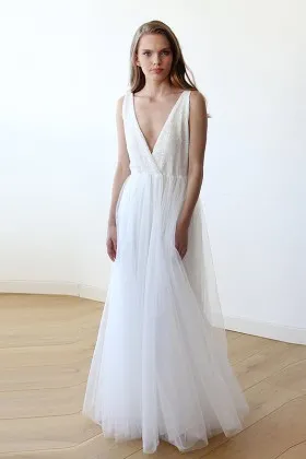 glittering sexy plunging V neckline sleeveless white tulle informal bridal dress