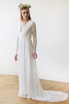 elegant white lace plunging scalloped V neckline long sleeve vintage bridal dress