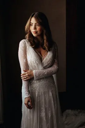 beaded ivory lace and tulle long sleeve figure flattering mermaid wedding dress