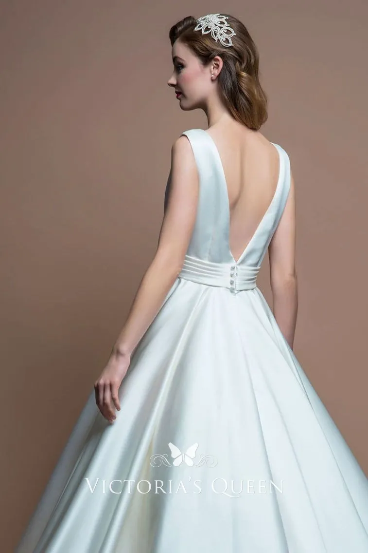 1950s vintage tea length A line ivory satin sleeveless wedding dress