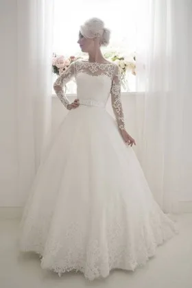 Classic tulle ballgown wedding dress with lace appliqued long sleeves