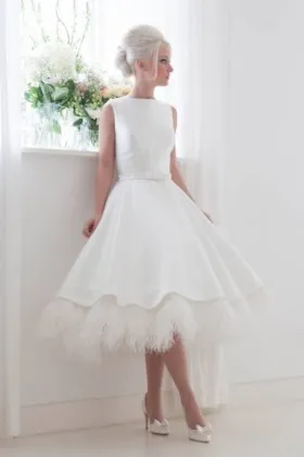 Fun and flirty tea length satin with ostrich feather wedding dress