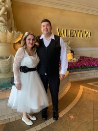 beautiful tea length wedding dress with black belt