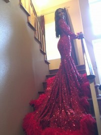 red sequin prom dress with feather long train